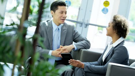 multi ethnic male female business people in meeting