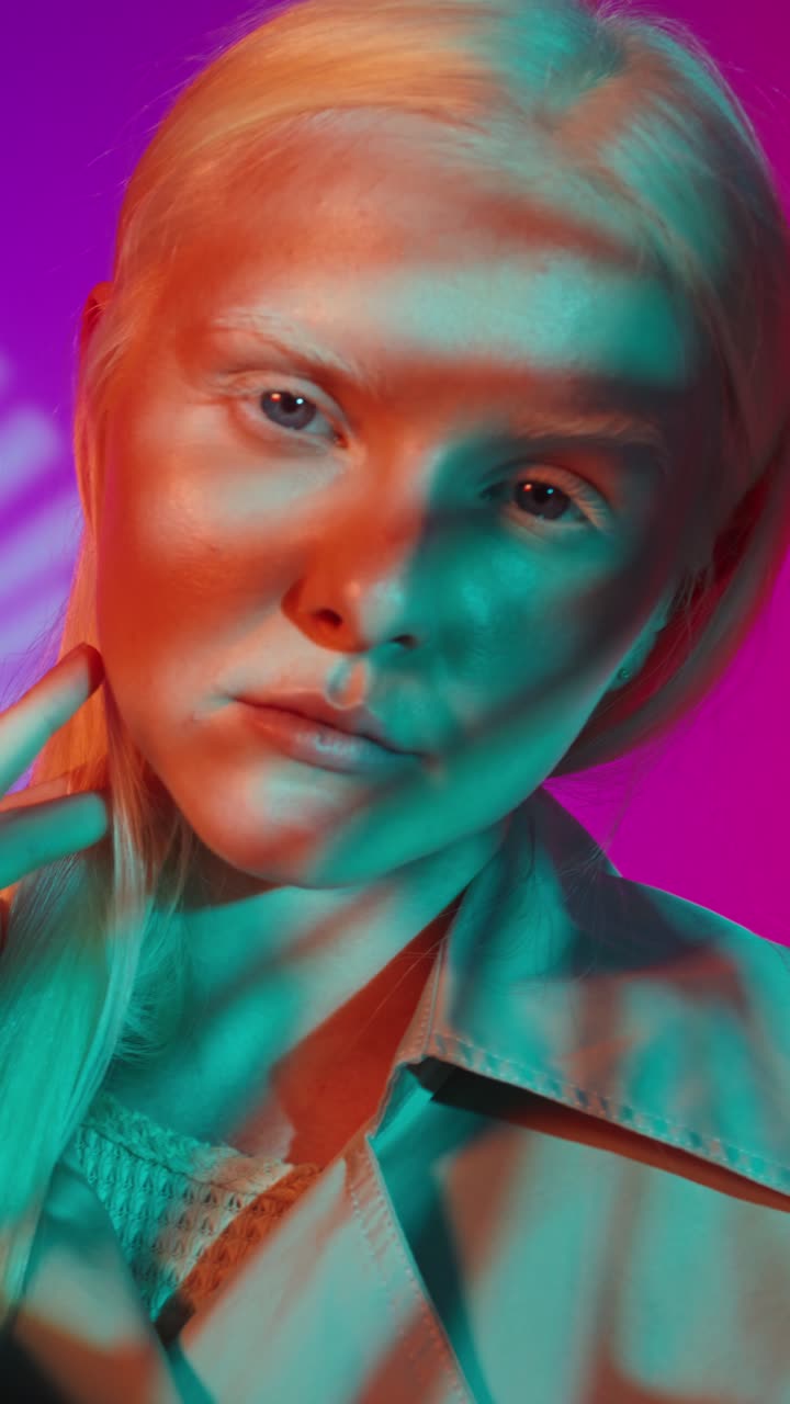 Portrait of a Blonde Woman in Neon Lights