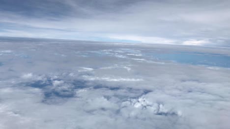 view of clouds from the window of the airplane