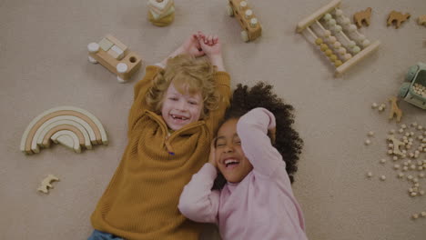 children laying on the floor