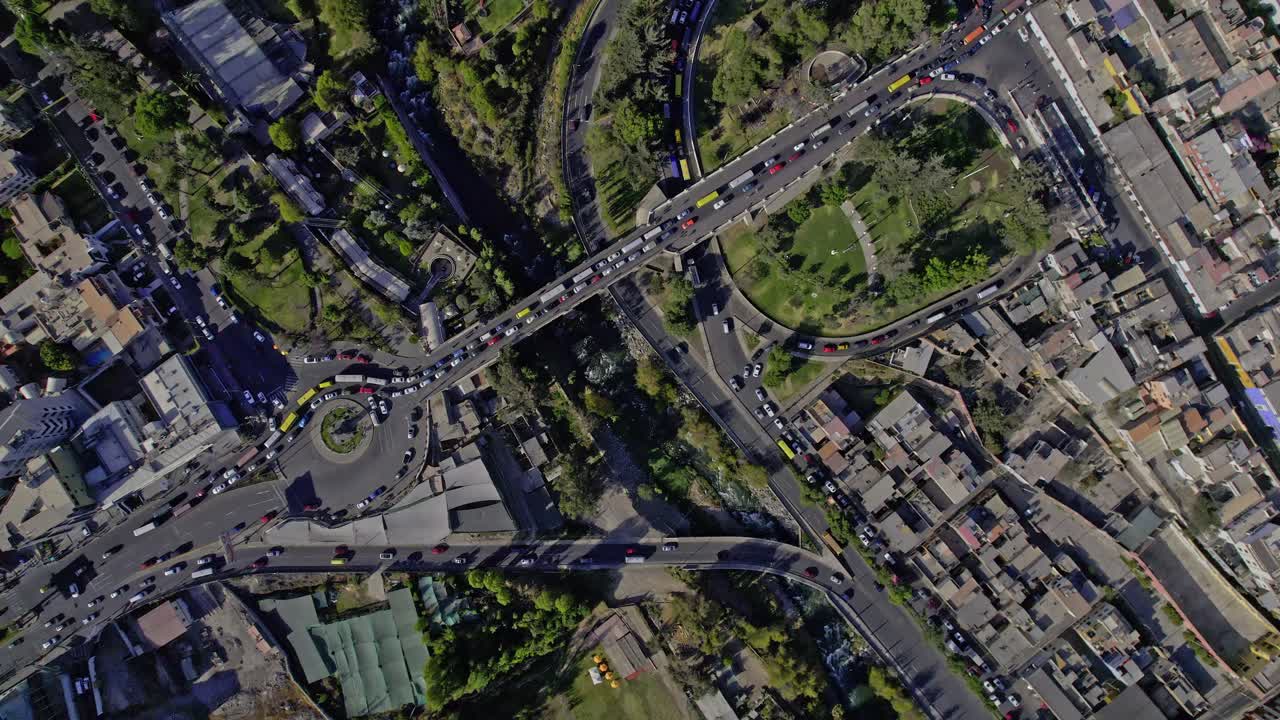 Aerial Top-Down View of Busy City Intersection with Traffic