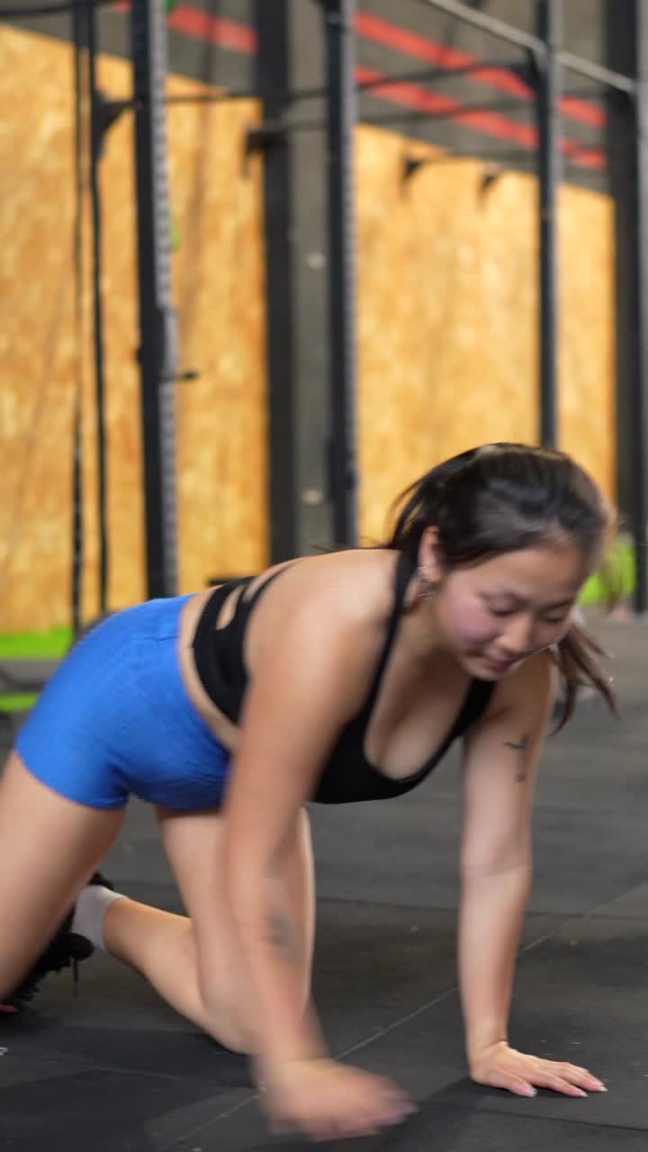 Woman doing fitness exercises in a gym