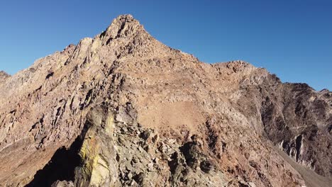 Aerial-shot-of-mountain-peaks-in-South-Rockies,-backward-movement