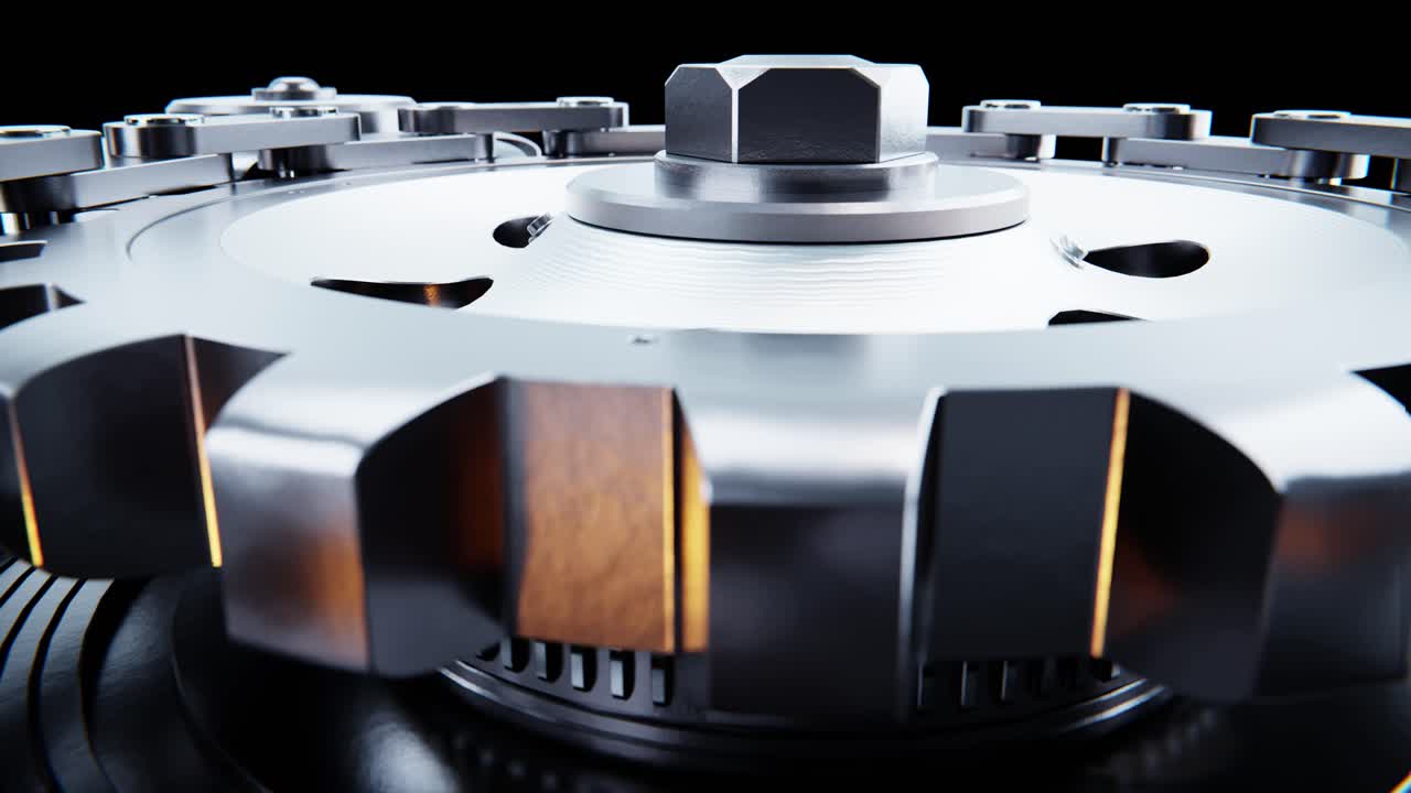 Close-up of Rotating Metal Gears and Chain Mechanism