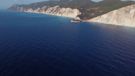 wide shot on drone flight shows dramatic cliffs at porto katsiki, lefkada, greece