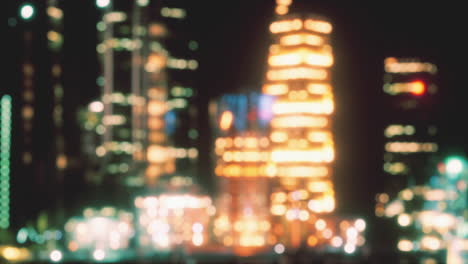 escena de fondo del paisaje urbano borroso por la noche