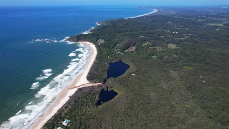 broken head beach and headland in new south wales, australia - aerial panoramic