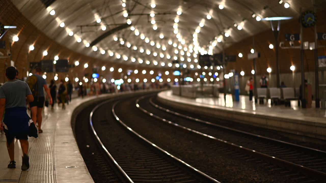 People at the Monte Carlo train station in Monaco