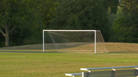 empty soccer field in the early morning