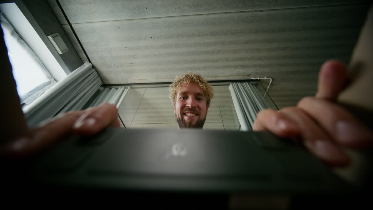 Unboxing Experience:  A Man Opens a Package