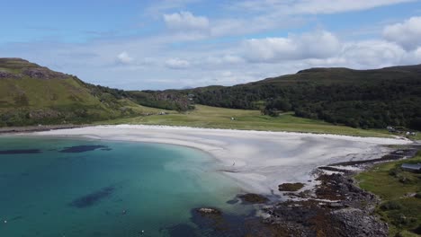 stunning white sand beach and blue sea at calgary bay on isle of mull inner hebrides scotland aerial drone footage 4k hd rise up