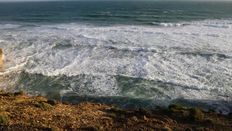 ocean waves hitting rocky coast in melbourne