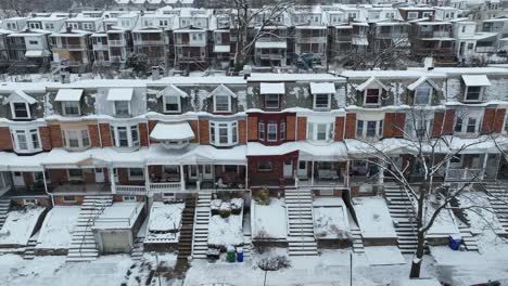 Colorful-row-homes-in-urban-American-city-at-snowy-winter-day