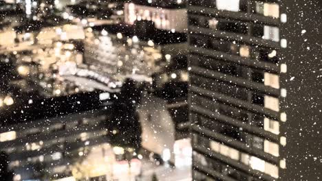 Digital-composition-of-snow-falling-against-tall-buildings