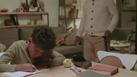 boy studying at home