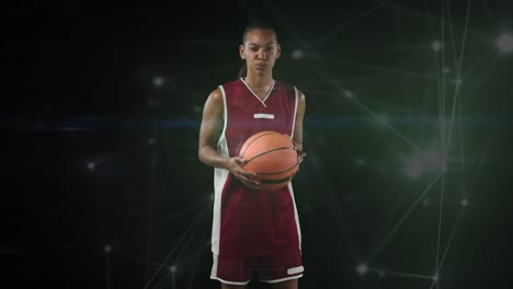 animation of network of connections over female basketball player on black background