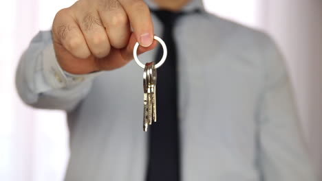 Businessman-Show-New-Home-Key