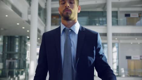 businessman moving upstairs on escalator in the office 4k