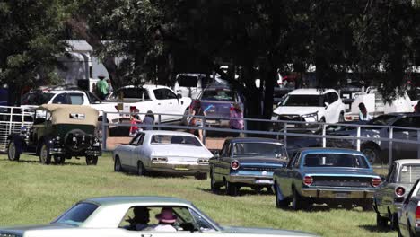 vintage cars displayed at outdoor event