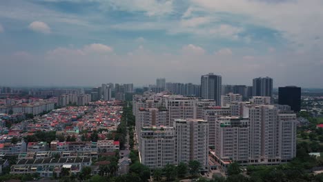 Aerial-suburban-view-on-sunny-day-with-large-apartment-and-housing-development-on-river-2