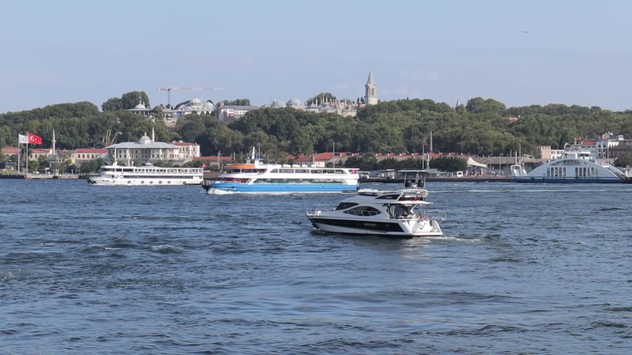 Boats float on the waters of Bosporus Bay, Istanbul, Turkey, capturing the serene and scenic essence of the bay's maritime activity