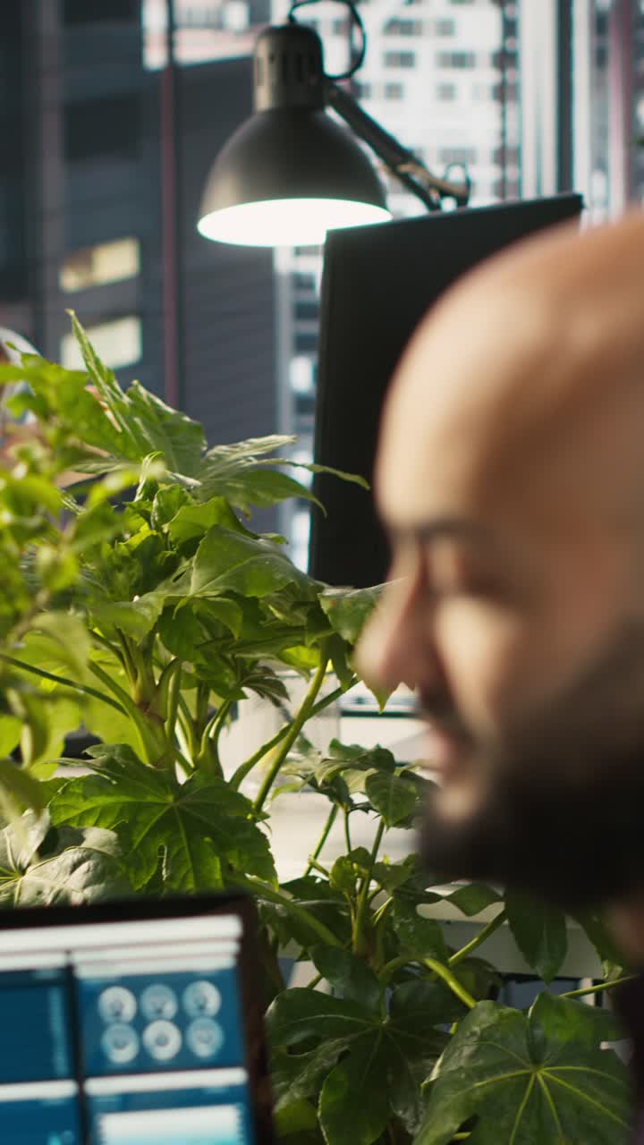 Vertical video Startup staff member working to hit revenue performance targets