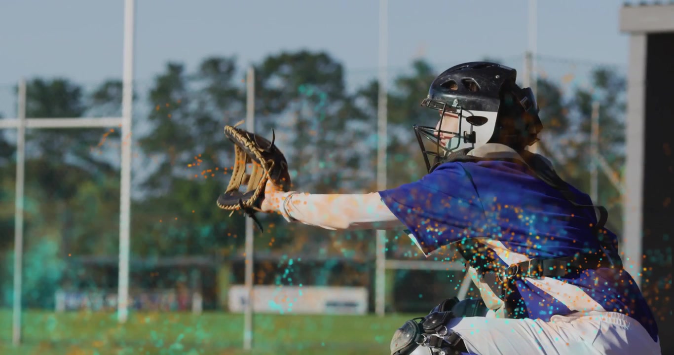 Female baseball catcher catching incoming throw with teal-gold powder on glove guiding throw back