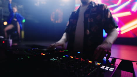 dj performing at a nightclub