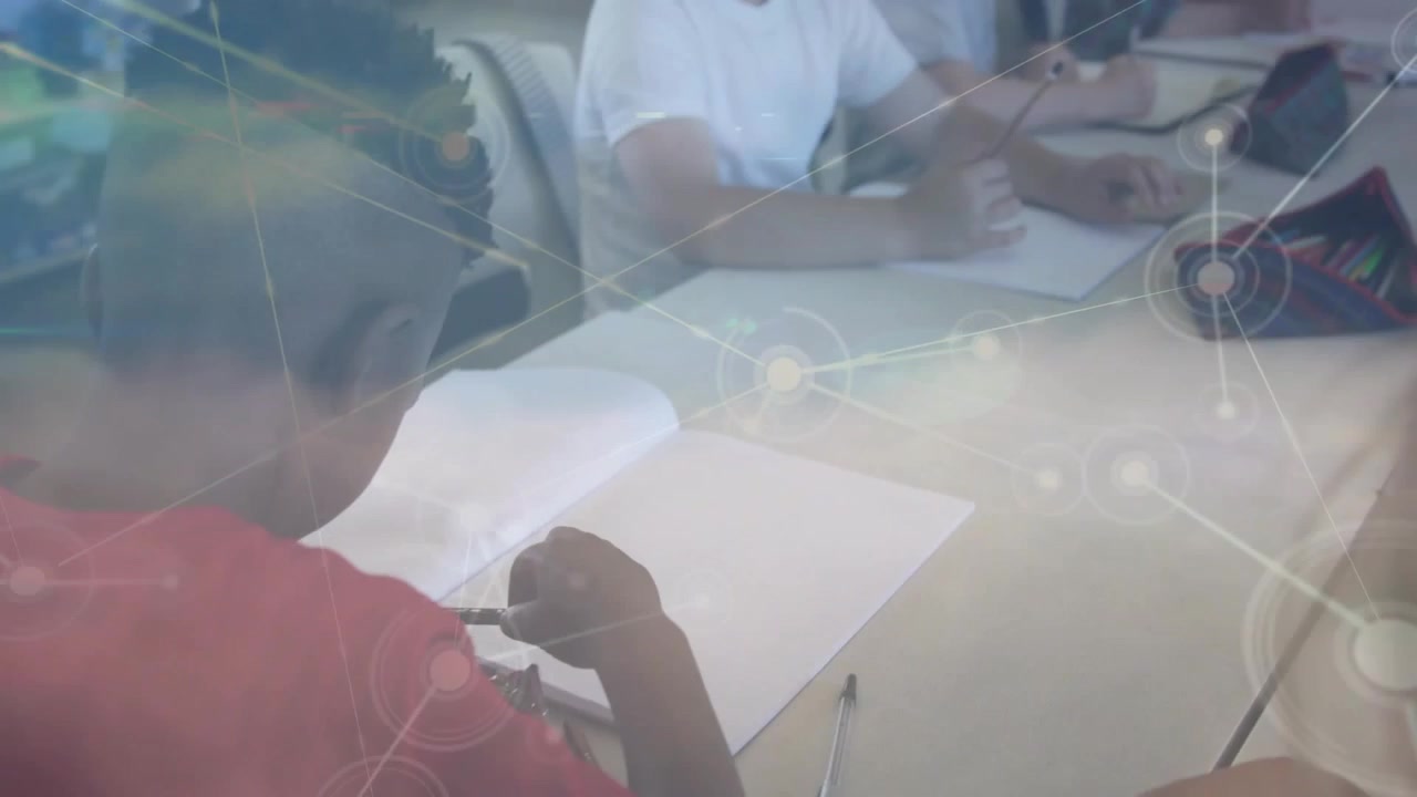 Girl in red shirt adjusting pencil grip practicing drawing as cloud overlay blending over classroom