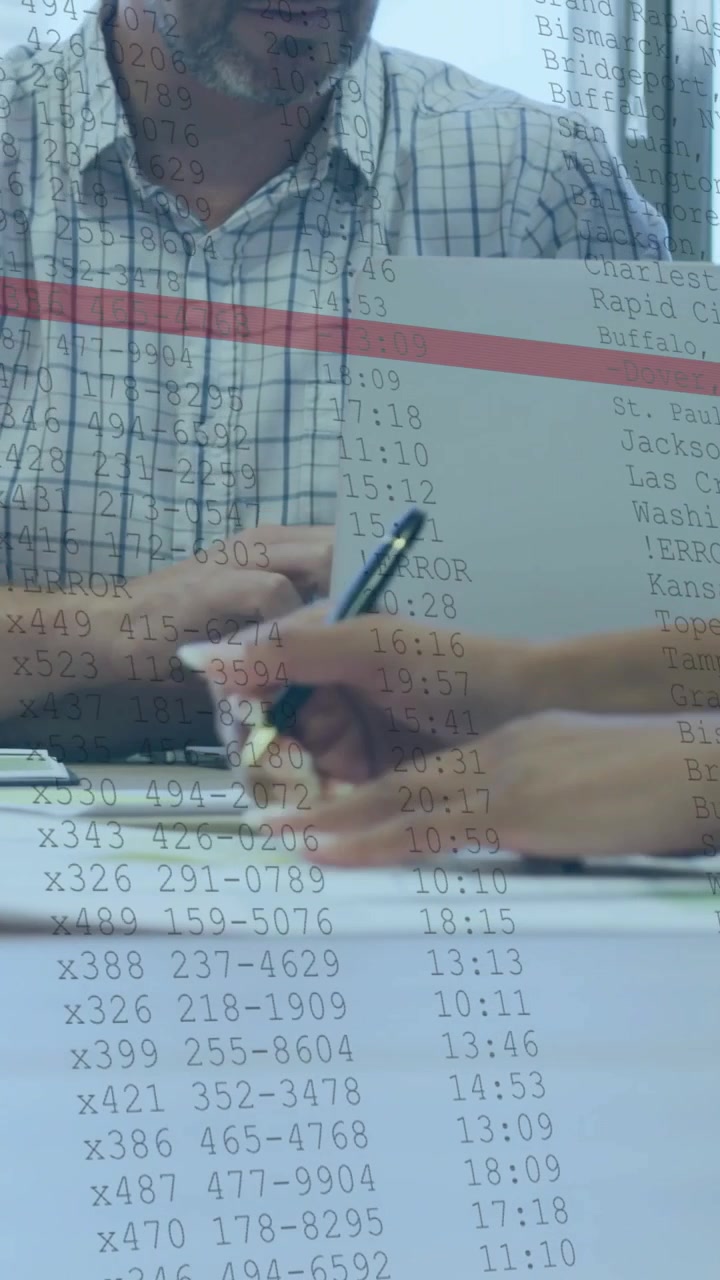 Vertical video: Woman offering pen to man accepting and signing finance forms over sheet and laptop