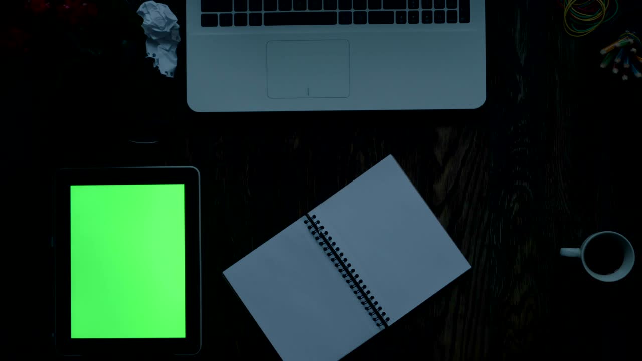 Top view of wooden table with office supplies