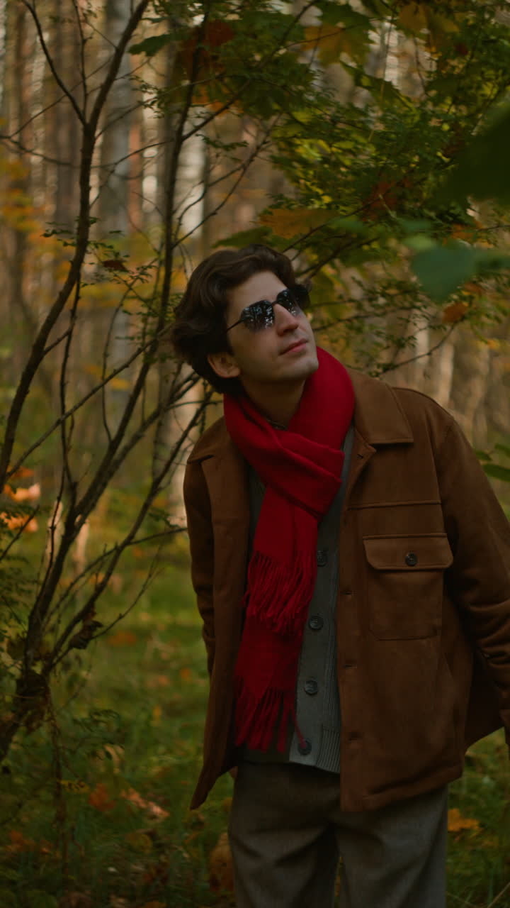 Man in Forest with Red Scarf