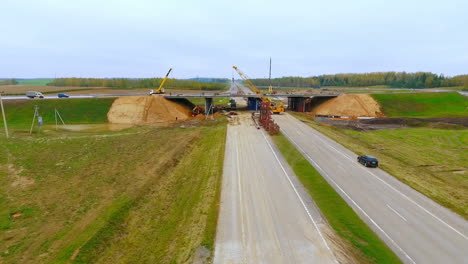 aerial view construction bridge over highway road. repair suburban road