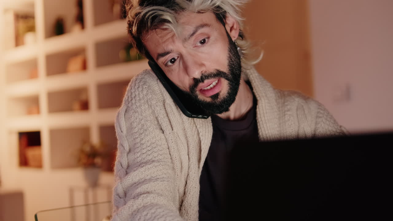 Gay Couple Working From Home on Laptop