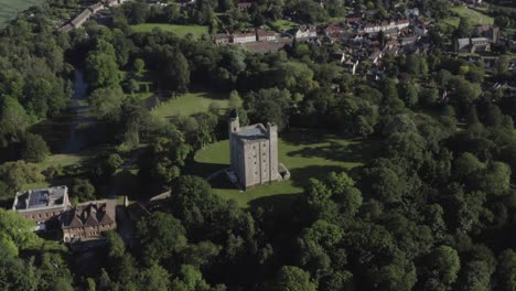 castle hedingham as the central piece with the camera panning left