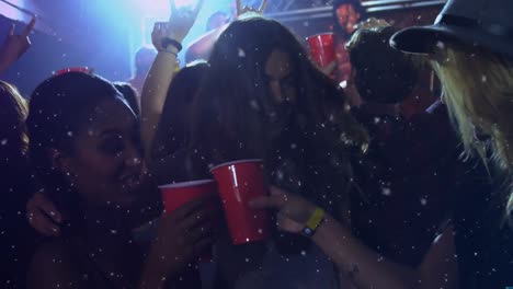 animation of spots falling over happy people dancing in club
