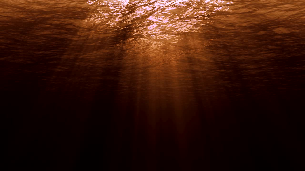 un bucle perfectamente sin costuras de ondas azules profundas del océano caribe desde el fondo submarino en la puesta de sol dorada, rayos de luz cálidos brillando