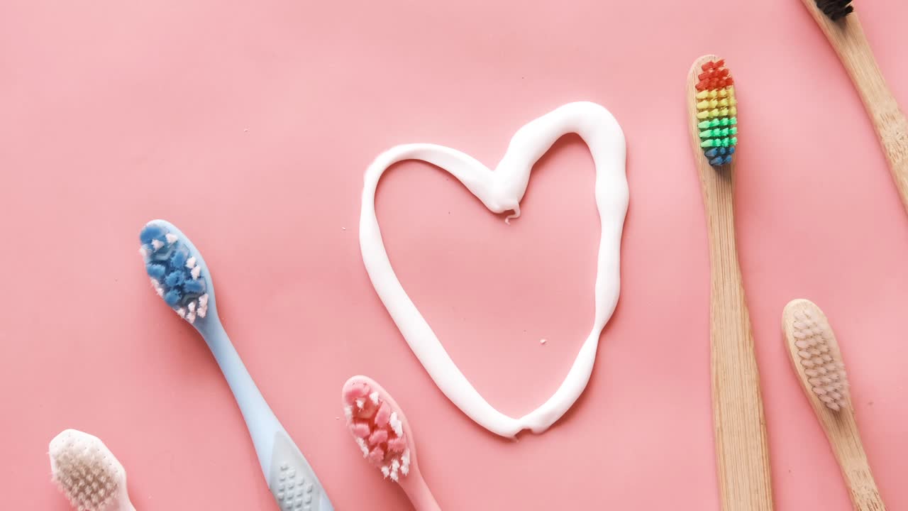 Heart of Toothpaste and Colorful Toothbrushes