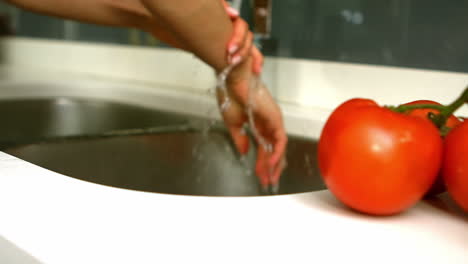 woman cleaning her hands