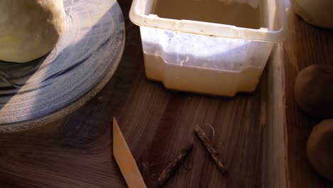 molded clay on pottery wheel