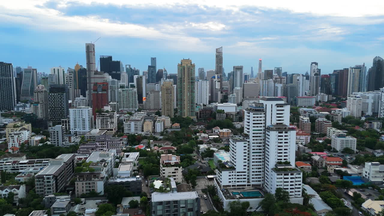 Wide angle establishing aerial view Phrom Phong district in Bangkok city