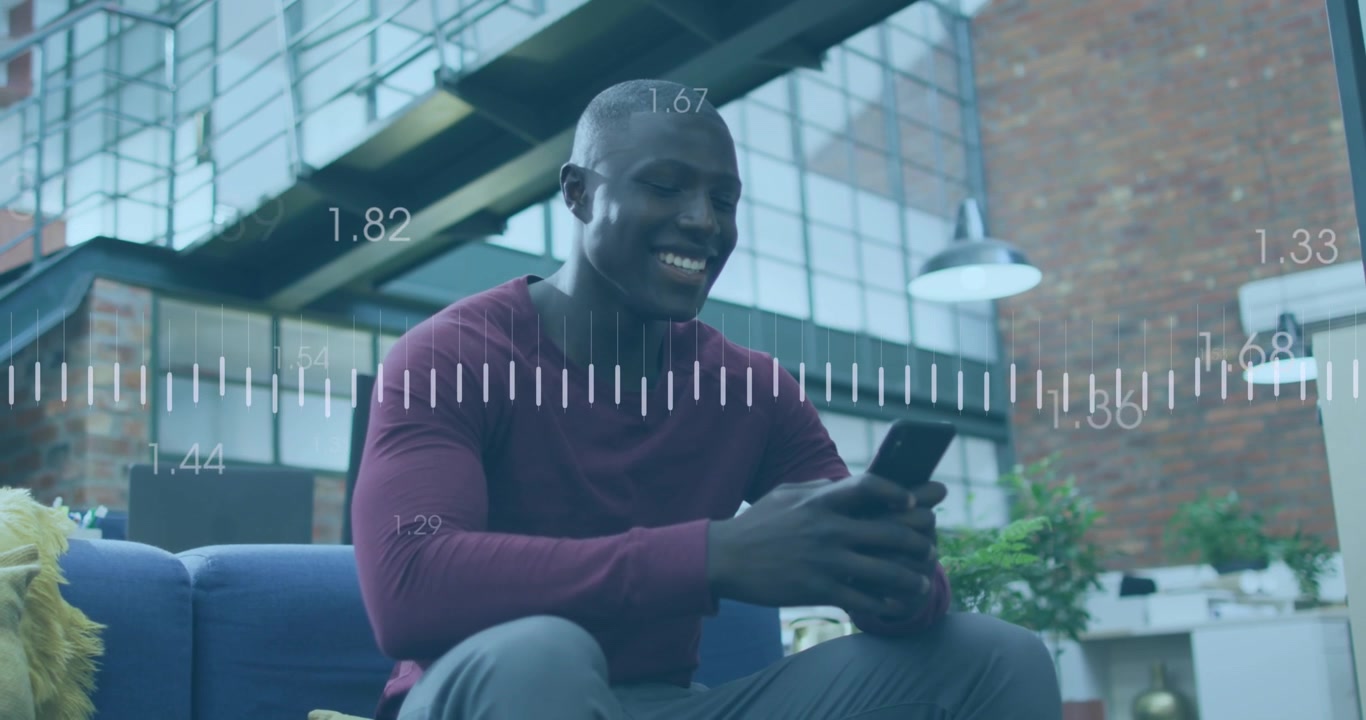 Young Man Using Smartphone in Modern Office with Data Overlay