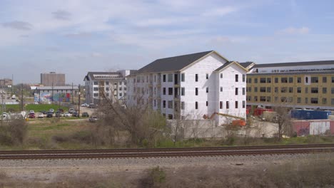 establishing drone shot of new housing construction in east houston, texas