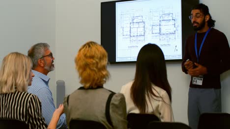 businessman giving presentation in conference room 4k