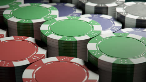 casino tokens or chips arranged on a green poker table. seamlessly looping video showing poker chips in neat stacks. can represent gambling, luck, success, las vegas, money, victory, win, jackpot. 4k