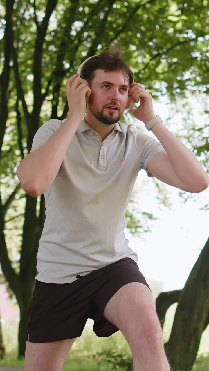 Runner jogger man starting smart watch timer and running checking heart rate monitor before jogging