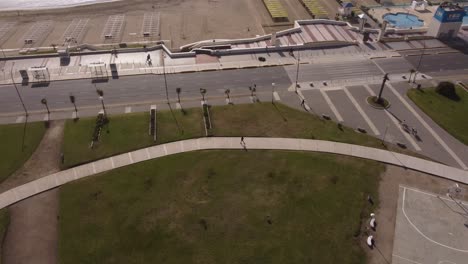 Person-walking-alone-in-park-at-Mar-del-Plata-in-Argentina