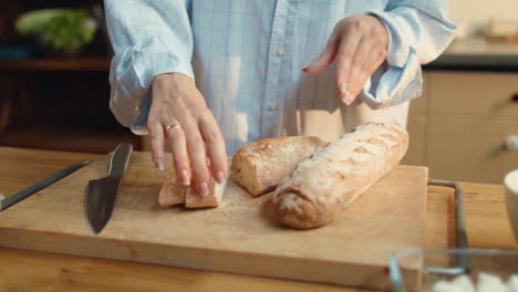 woman slicing bread