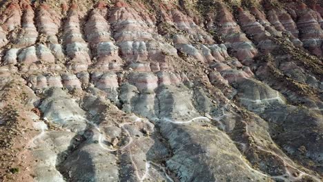 sandstone layers on rock formation in utah desert landscape. aerial of hill in quail creek state park usa