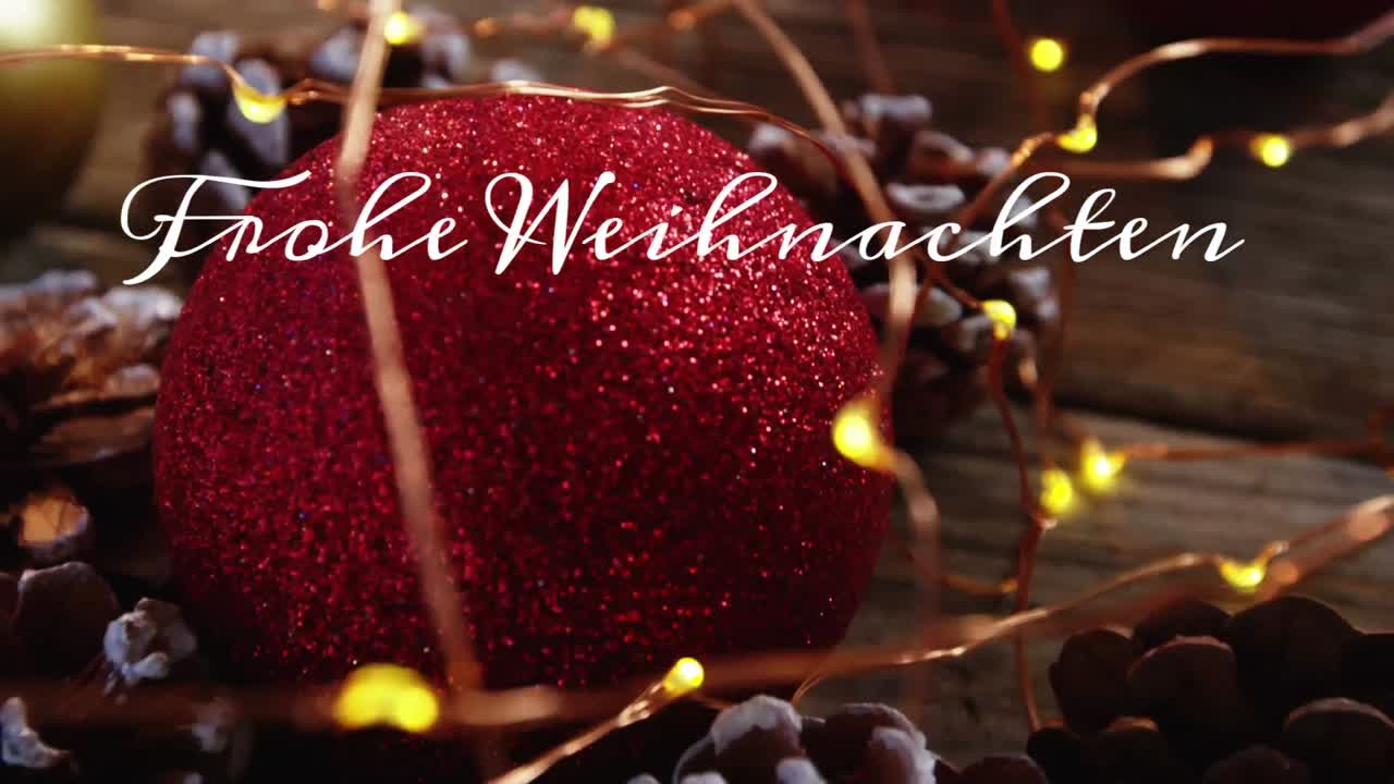 animación del texto de saludo alemán sobre la decoración de las joyas de navidad